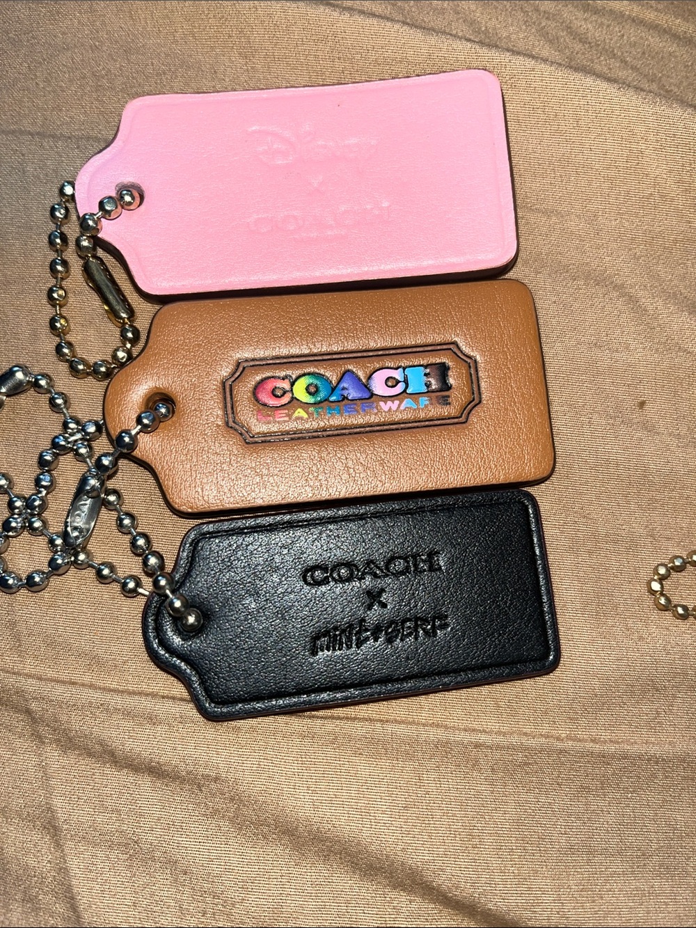 Coach special Disney bundle 3  tags